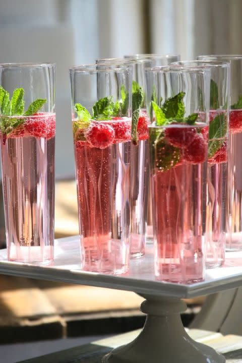 <p>Add splash of cranberry juice, a handful of raspberries, and a mint sprig for this gorgeous concoction. </p><p><strong>Get the recipe at <a rel="nofollow noopener" href="http://www.loveyoumeanitblog.com/lifestyle/holiday/holiday-cocktail/" target="_blank" data-ylk="slk:Love You, Mean It;elm:context_link;itc:0;sec:content-canvas" class="link ">Love You, Mean It</a>.</strong></p>