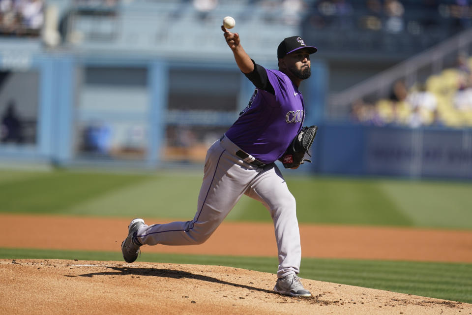 Colorado Rockies starting pitcher German Marquez throws to a Los Angeles Dodgers batter during the first inning of a baseball game, Sunday, Oct. 2, 2022, in Los Angeles. (AP Photo/Marcio Jose Sanchez)