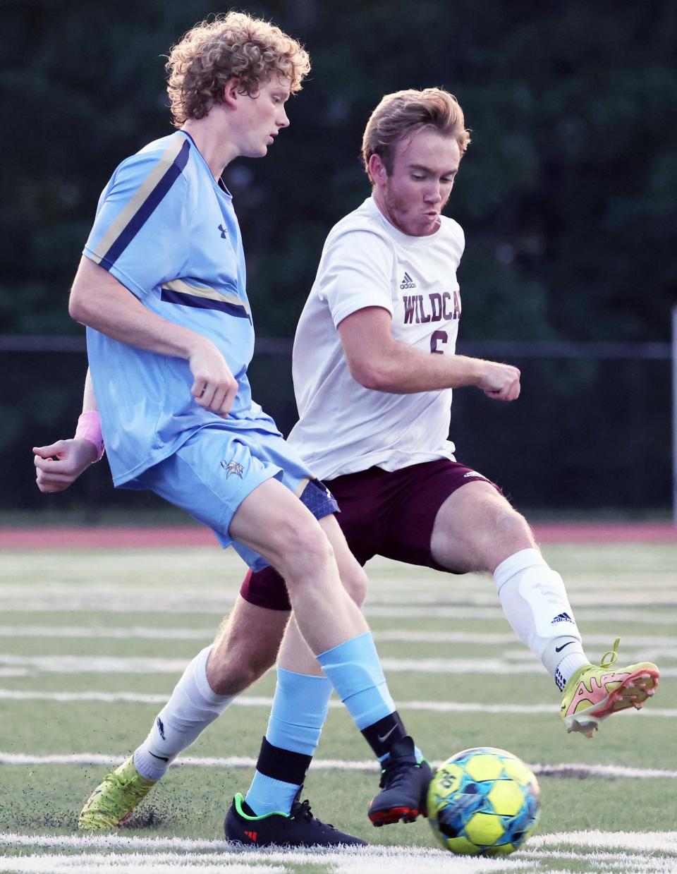 From left, East Bridgewater's Aidan Toomey and West Bridgewater's Ben Fuller go after a loose ball during a game on Wednesday, Sept. 14, 2022.  