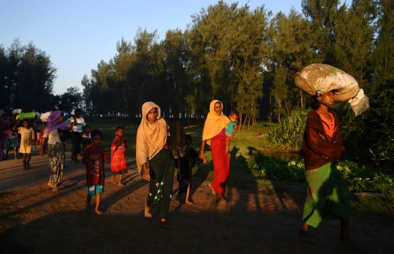 Families fleeing violence in Myanmar's Rakhine walk for days across hills and through jungles to reach the Bangladesh border, often with little food