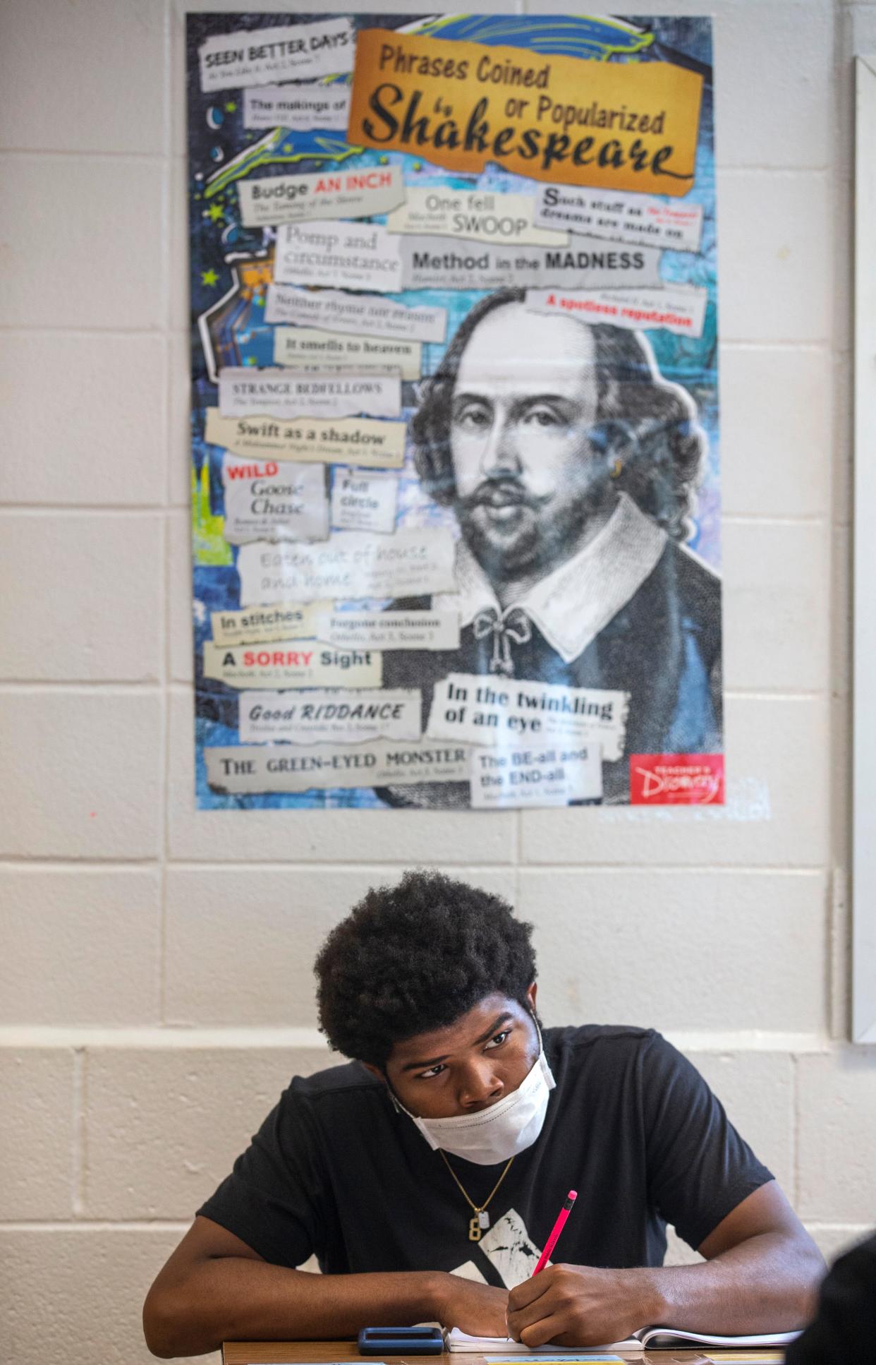 Iroquois High School student Zyrann Hibbitt looks up from his work in an English class at the school. May 10, 2021