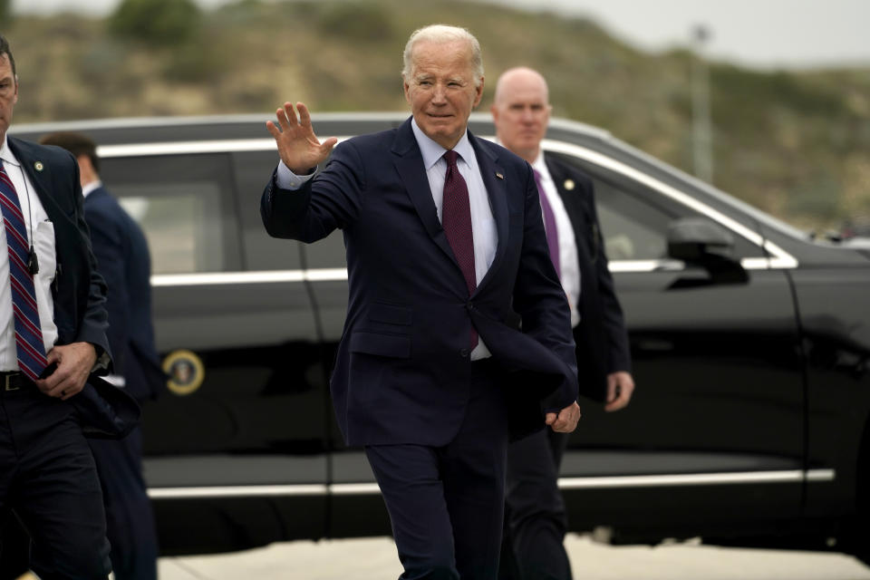President Joe Biden waves as he boards Air Force One at Los Angeles International Airport in Los Angeles, Sunday, Feb. 4, 2024, en route to Las Vegas to participate in campaign events. (AP Photo/Stephanie Scarbrough)