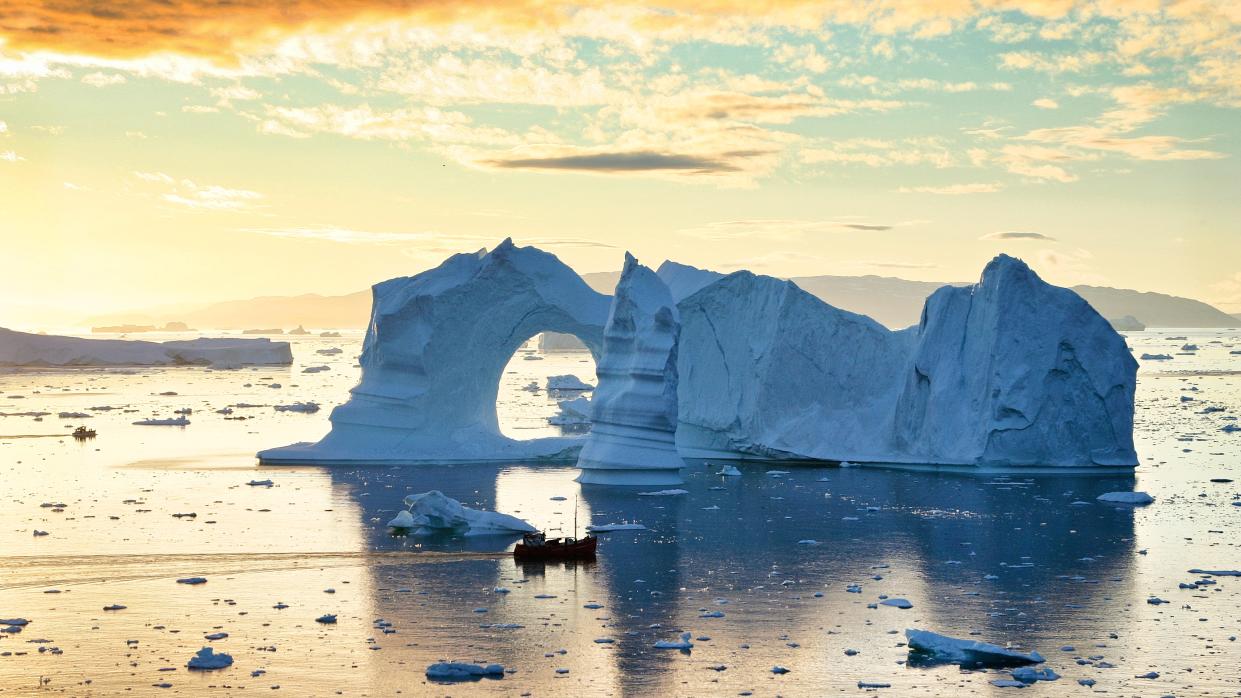 Icebergs in midnight sun, Disko Bay, Greenland.These icebergs have already spent two years travelling from the mighty Sermeq Kujalleq Glacier down the Ilulissat Icefjord before entering Disko Bay and starting their Atlantic journeys.