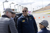 Nevada Gov. Joe Lombardo greets fans before the Pennzoil 400 NASCAR Cup Series auto race, Sunday, March 5, 2023, in Las Vegas. (AP Photo/Ellen Schmidt)