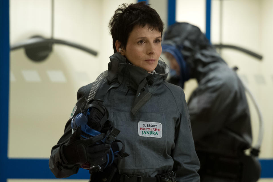 This film image released by Warner Bros. Pictures shows Juliette Binoche in a scene from "Godzilla." (AP Photo/Warner Bros. Pictures, Kimberley French)