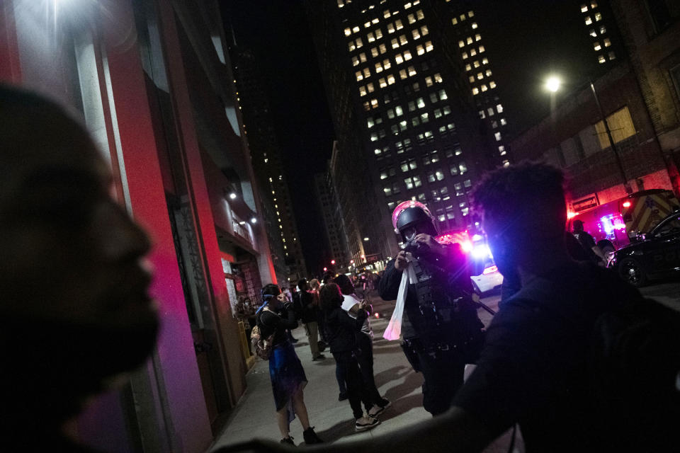 Detroit police confronts protesters as hundreds gather to protest over the death of George Floyd Saturday, May 30, 2020, in Detroit. Floyd died in police custody Monday in Minneapolis. (Nicole Hester/Ann Arbor News via AP)
