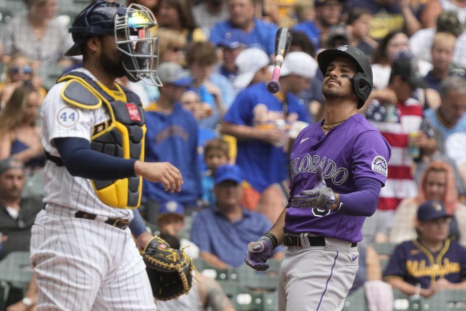 Colorado Rockies' Joshua Fuentes flips his bat after striking out during the second inning of a baseball game against the Milwaukee Brewers Sunday, June 27, 2021, in Milwaukee. (AP Photo/Morry Gash)