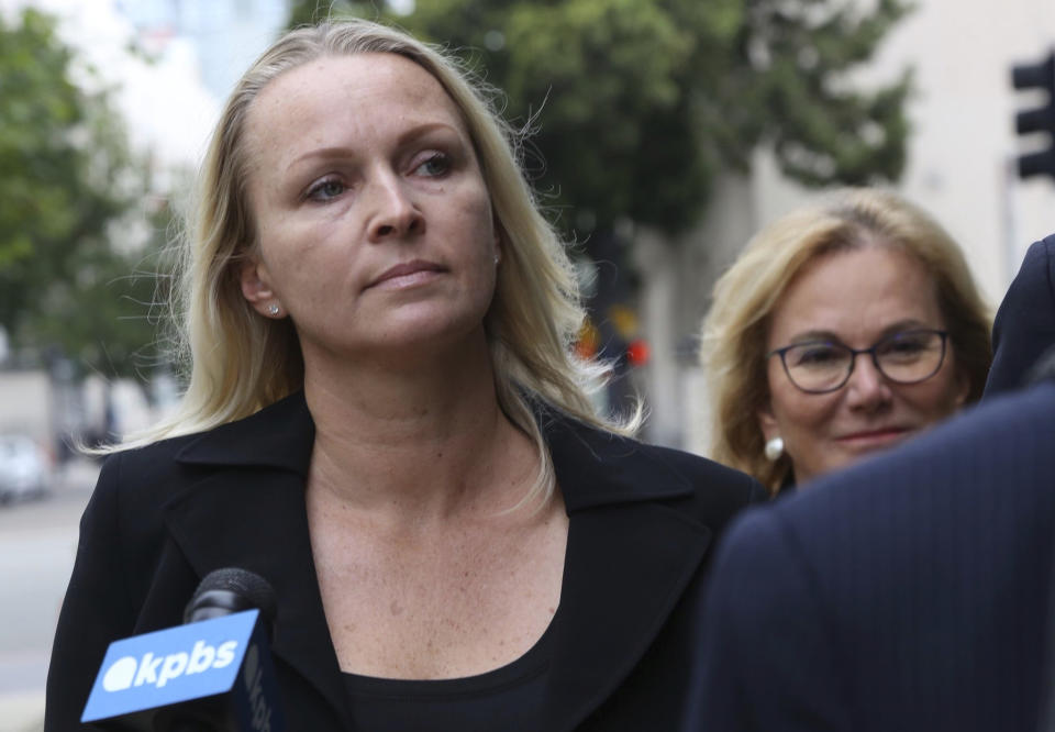 Margaret Hunter, left, wife of indicted Republican U.S. Rep. Duncan Hunter, arrives at federal courthouse in downtown San Diego on Thursday, June 13, 2019. Hunter, who had previously pleaded not guilty to correction charges, withdrew that plea in U.S. court in San Diego and pleaded guilty to a single count carrying a sentence of up to five years in prison. The misuse of campaign funds spanned from 2010 to the end of 2016. (John Gibbins/The San Diego Union-Tribune via AP)