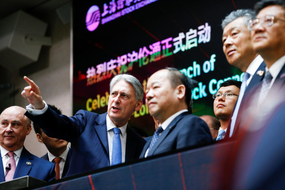 LONDON, ENGLAND - JUNE 17: British Chancellor of the Exchequer Philip Hammond and Chinese Vice-Premier Hu Chunhua attend the opening of the markets at the London Stock Exchange on June 17, 2019 in London, England. (Photo by Henry Nicholls - WPA Pool/Getty Images)