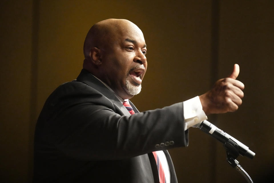 FILE -Republican Governor candidate North Carolina Lt. Gov. Mark Robinson speaks at an election night event in Greensboro, N.C., March 5, 2024. In his bid to become North Carolina's first Black governor, Robinson assails government safety-net spending as a "plantation of welfare and victimhood" that he says has mired generations of Black people in "dependency" and poverty. But the firebrand lieutenant governor's political rise wouldn't have been possible without it. (AP Photo/Chuck Burton, File)