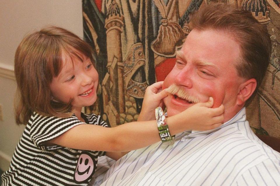 Richard Jewell's goddaughter plays as Jewell is interviewed about his experience as a suspect in the Centennial Olympic Park bombing. | Ric Feld/AP/Shutterstock