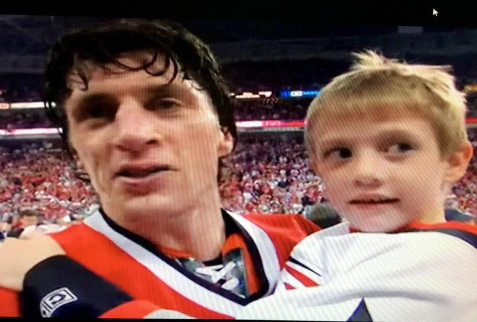 Frame grab from Carolina Hurricanes produced video showing captain of the 2006 Stanley Cup championship team Rod Brind’Amour, left, and his son Skyler Brind’Amour on the ice after the team won the Cup in June 2006.