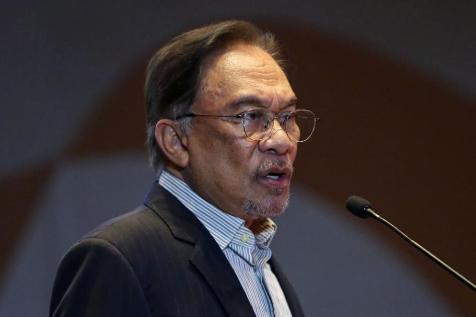 PKR president Datuk Seri Anwar Ibrahim was asked to comment on his party deputy’s remarks yesterday in support of Dr Mahathir serving out a full term as prime minister instead of passing the baton to Anwar as promised. — Picture by Yusof Mat Isa