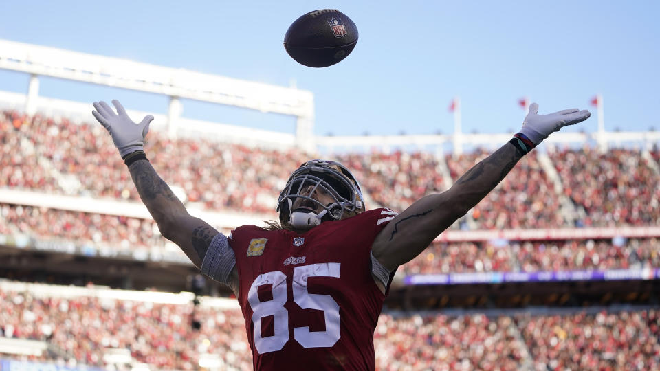 San Francisco 49ers tight end George Kittle (85) celebrates after scoring against the Tampa Bay Buccaneers during the second half of an NFL football game in Santa Clara, Calif., Sunday, Nov. 19, 2023. (AP Photo/Godofredo A. Vásquez)