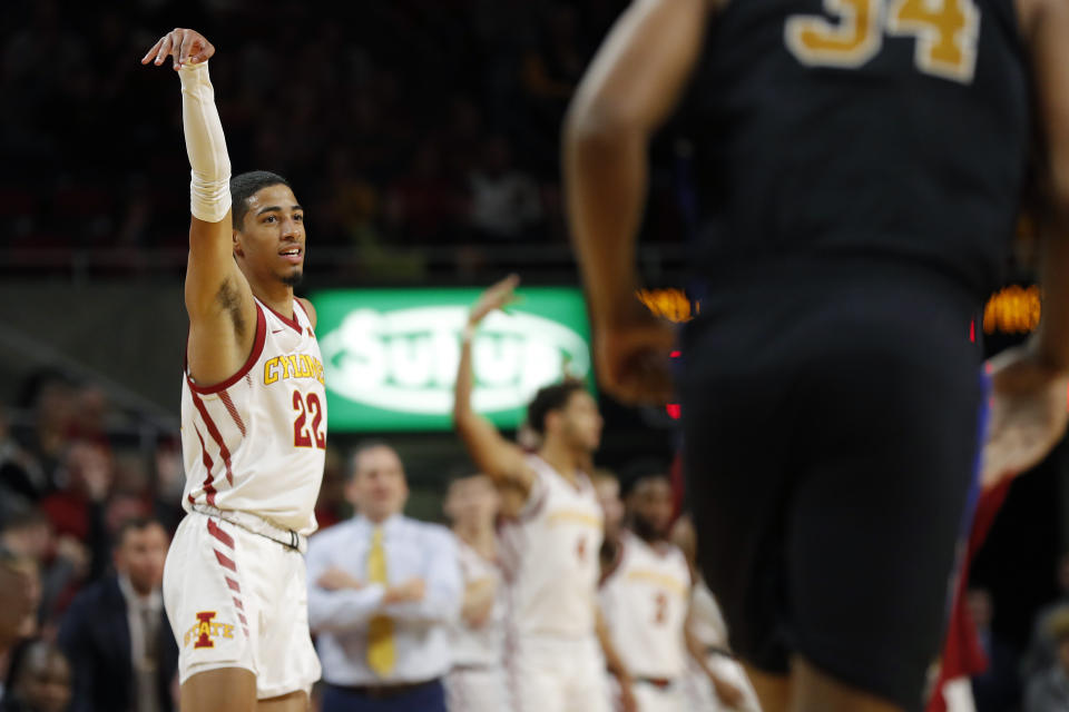 Iowa State guard Tyrese Haliburton, left, celebrates a three-point basket during the first half of an NCAA college basketball game against Purdue Fort Wayne, Sunday, Dec. 22, 2019, in Ames, Iowa. (AP Photo/Matthew Putney)
