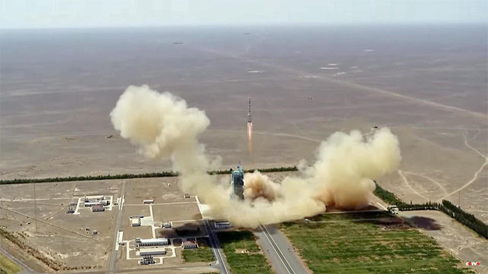 A Chinese Long March 2F rocket blasts off from the remote Jiuquan Satellite Launch Center in Inner Mongolia, boosting three taikonauts into orbit for a flight to China's Tiangong space station. China plans to keep the outpost staffed with rotating crews from this point forward to establish a permanent presence in low-Earth orbit. / Credit: CCTV