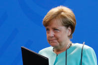 <p>German Chancellor Angela Merkel delivers a statement about Trump’s global climate deal announcement at the Chancellory in Berlin, Germany, June 2, 2017. (Fabrizio Bensch/Reuters) </p>