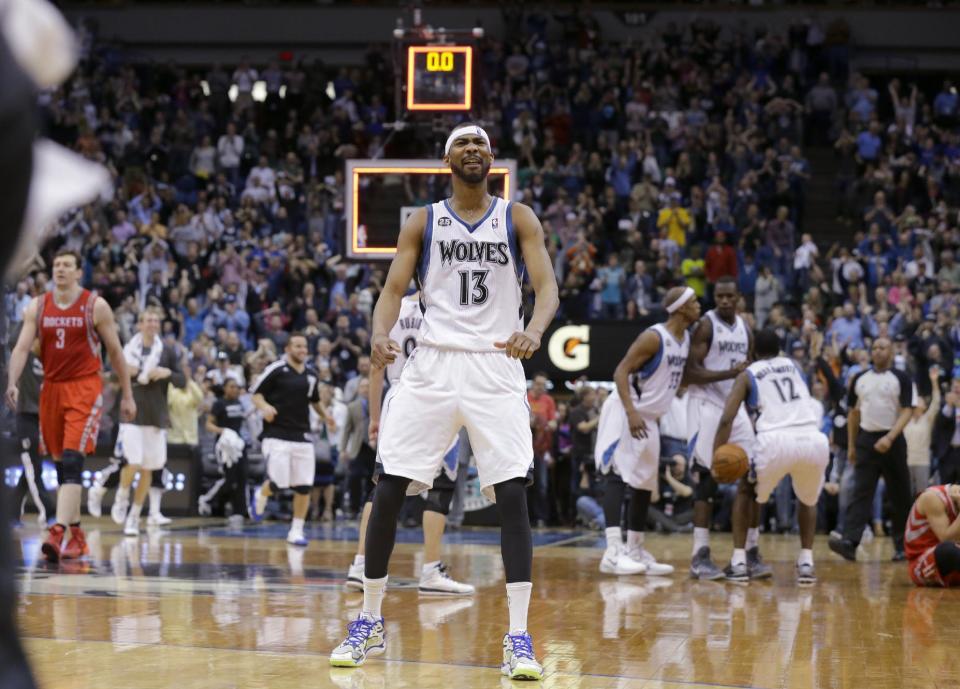 Minnesota Timberwolves forward Corey Brewer reacts after the Timberwolves defeated the Houston Rockets 112-110 during an NBA basketball game in Minneapolis, Friday, April 11, 2014. (AP Photo/Ann Heisenfelt)