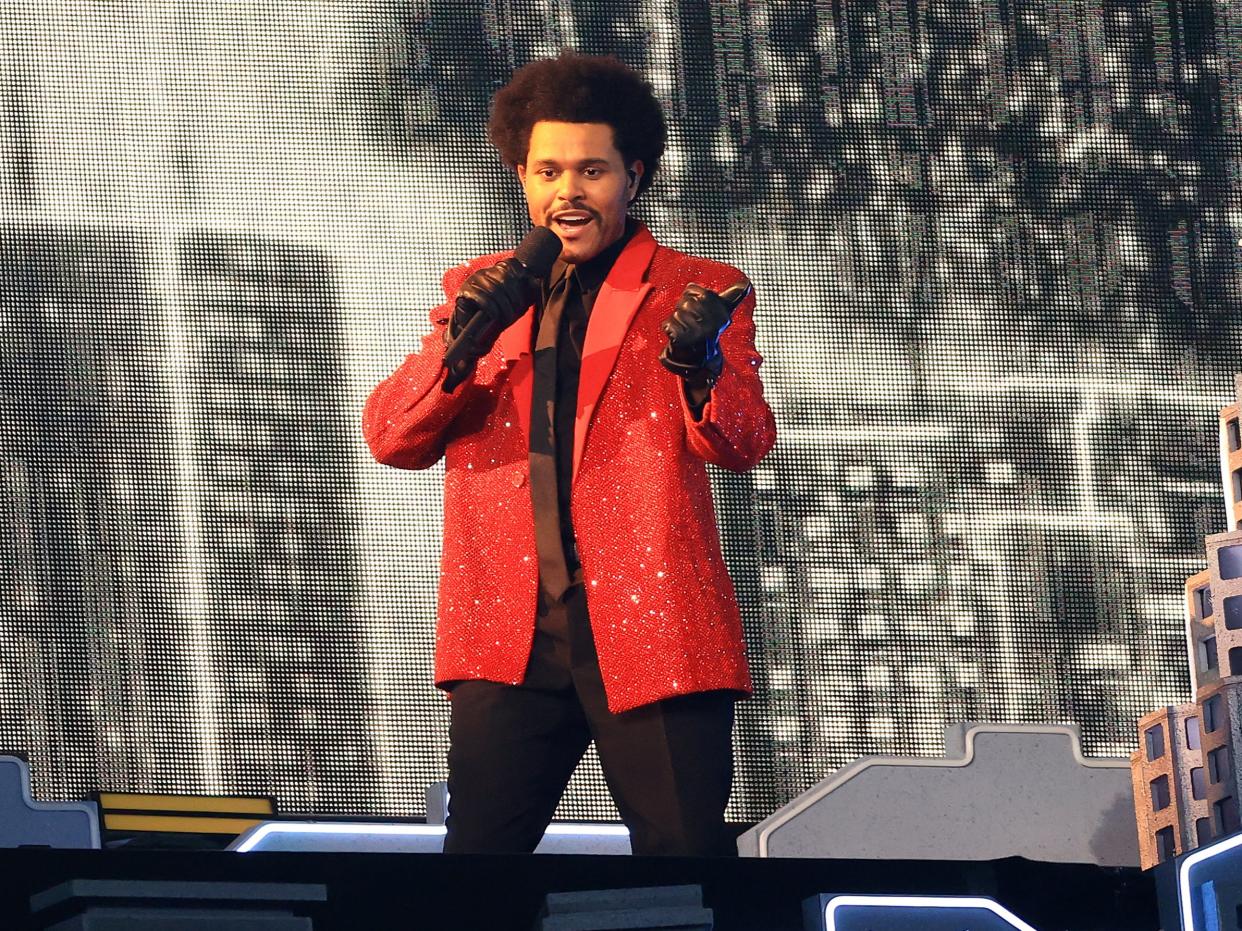 The Weeknd performs during the Super Bowl LV Halftime Show on 7 February 2021 in Tampa, Florida (Mike Ehrmann/Getty Images)