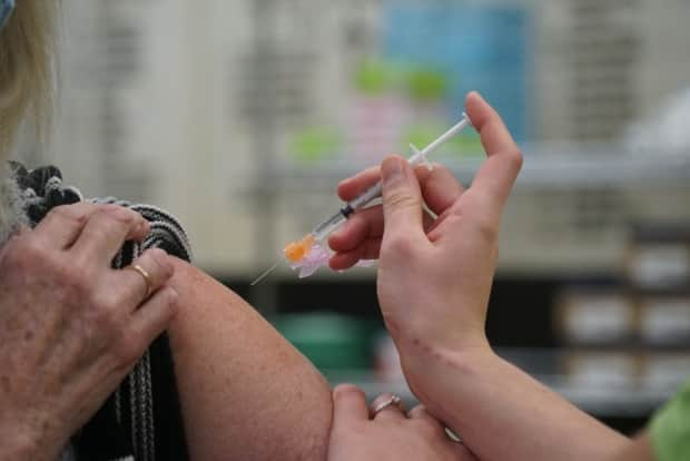 Saskatchewan vaccine clinics work off lists of alternate recipients once the list of available priority vaccine targets has been exhausted.  (Kate Dubinski/CBC - image credit)