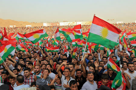 Kurdish people attend a rally to show their support for the upcoming September 25th independence referendum in Duhuk, Iraq September 16, 2017. REUTERS/Ari Jalal