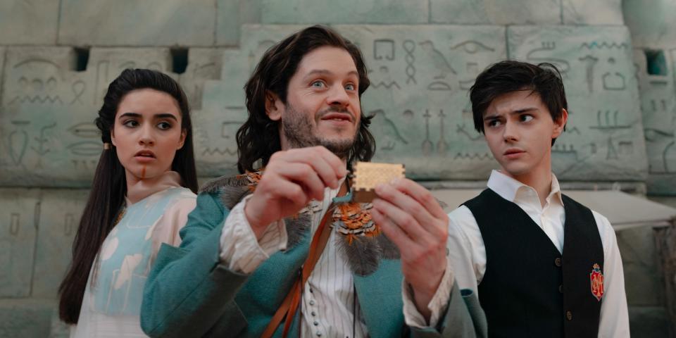 Music student Tim (Jack Wolfe, right) gets transported to a fantasy world, meets Princess Pamina (Asha Banks, left) and gets a sidekick in the mercurial Papageno (Iwan Rheon, center) in the operatic fantasy adventure "The Magic Flute."