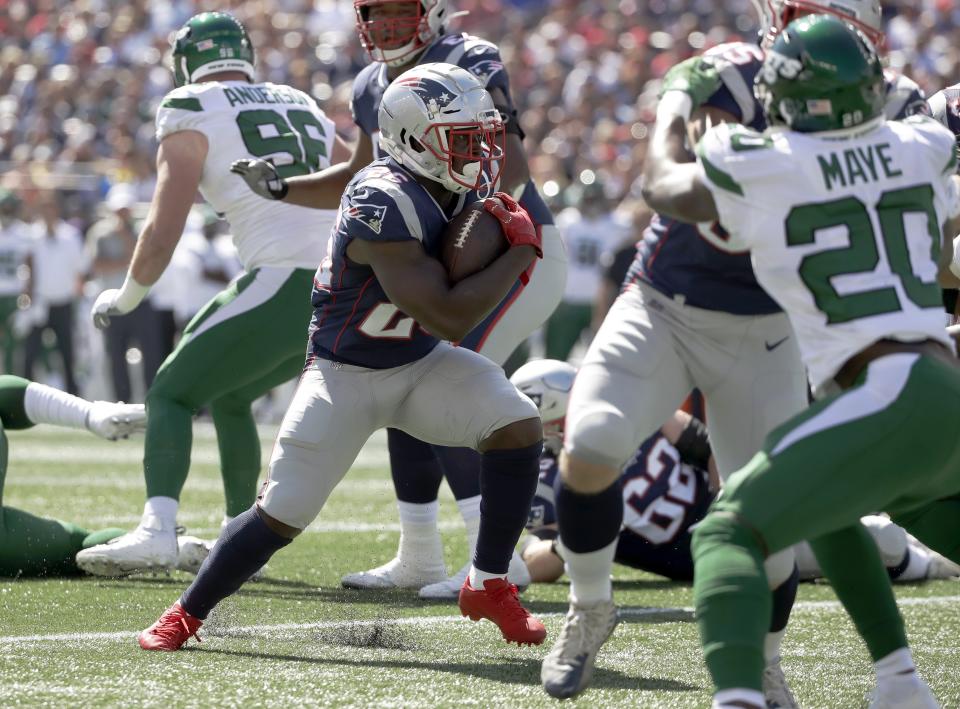 New England Patriots running back Sony Michel, center, runs for a touchdown against the New York Jets in the first half of an NFL football game, Sunday, Sept. 22, 2019, in Foxborough, Mass. (AP Photo/Elise Amendola)