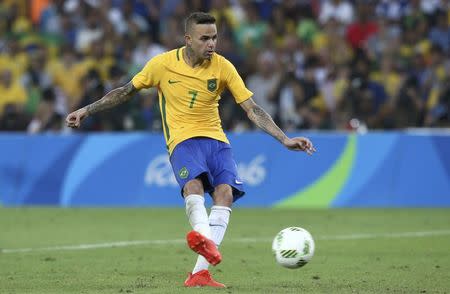 2016 Rio Olympics - Soccer - Final - Men's Football Tournament Gold Medal Match Brazil vs Germany - Maracana - Rio de Janeiro, Brazil - 20/08/2016. Luan (BRA) of Brazil kicks the ball during penalty shootout. REUTERS/Marcos Brindicci