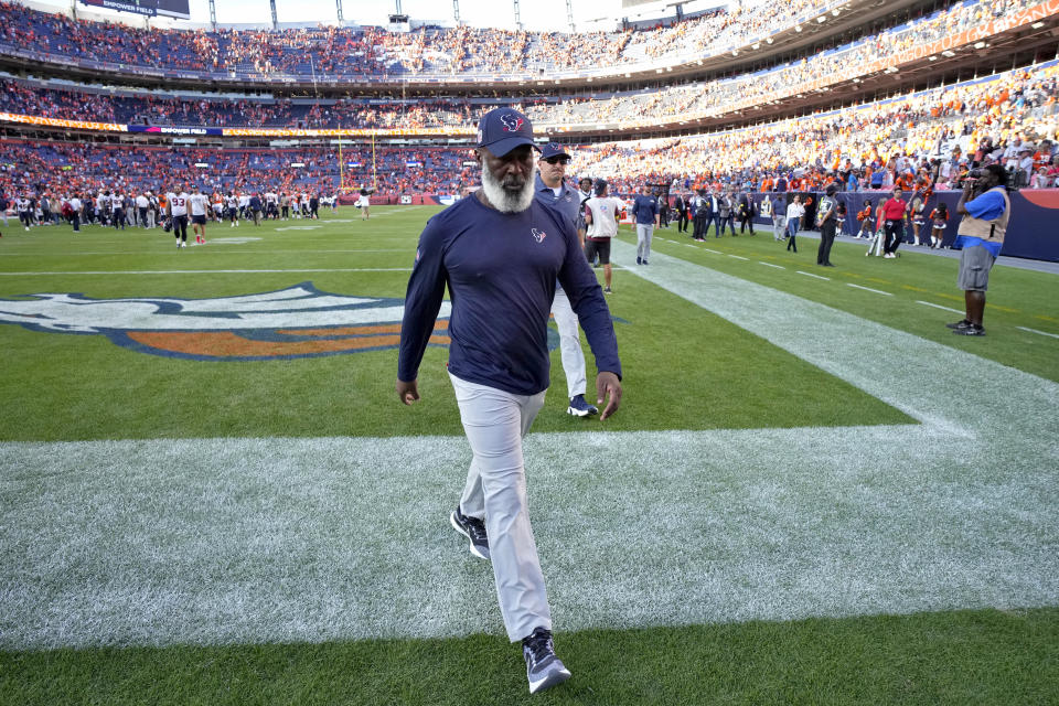 Houston Texans head coach Lovie Smith leaves the field after an NFL football game against the Denver Broncos, Sunday, Sept. 18, 2022, in Denver. The Broncos defeated the Texans 16-9. (AP Photo/David Zalubowski)