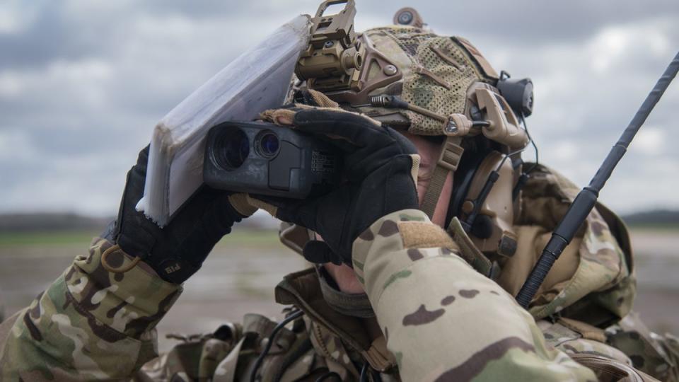 A special tactics operator stationed at the 352nd Special Operations Wing at RAF Mildenhall uses a scope to look at a target while training for close air support during exercise Valiant Liberty at RAF Sculthorpe Training Range, U.K., March 9, 2020. (Staff Sgt. Rose Gudex/Air Force)