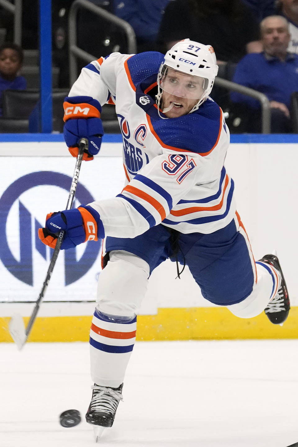 Edmonton Oilers center Connor McDavid (97) shoots against the Tampa Bay Lightning during the first period of an NHL hockey game Saturday, Nov. 18, 2023, in Tampa, Fla. (AP Photo/Chris O'Meara)