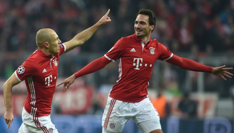 Bayern Munich's Arjen Robben (L) and Mats Hummels celebrate after scoring a goal during their UEFA Champions League round of 16 match against Arsenal, in Munich, on February 15, 2017