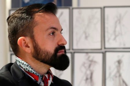 French designer Julien Fournie is seen in his workshop during an interview with Reuters ahead of his Spring-Summer 2018 Haute Couture fashion show presentation in Paris, France, January 15, 2018. Picture taken January 15, 2018.  REUTERS/Charles Platiau