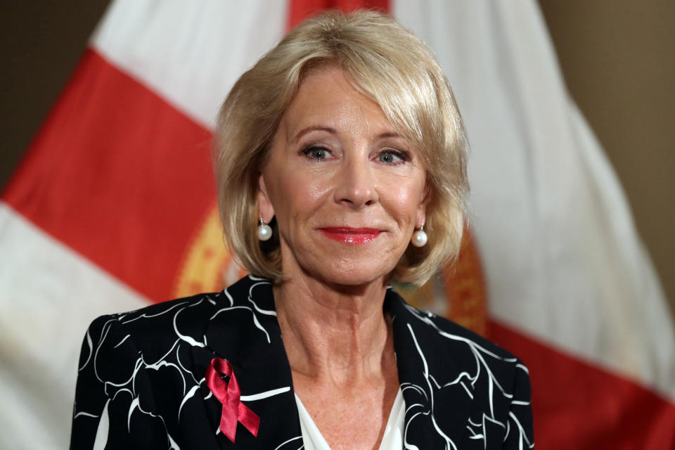 U.S. Secretary of Education Betsy Devos speaks during a news conference at the Marriot Heron Bay in Coral Springs, Fla., in 2018. Devos said on Tuesday warned an audience of a 'crisis' of rising college student loan debt and defaults on student loans. (Amy Beth Bennett/Sun Sentinel/TNS via Getty Images)