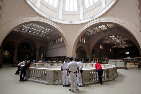 Policemen secure the area around pharaonic artifacts inside the Egyptian Museum in Cairo, Egypt June 23, 2016. REUTERS/Amr Abdallah Dalsh