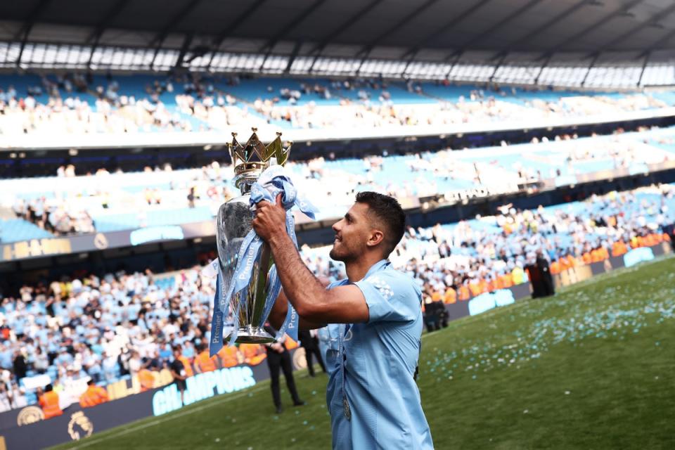 Rodri with the Premier League title (Getty Images)