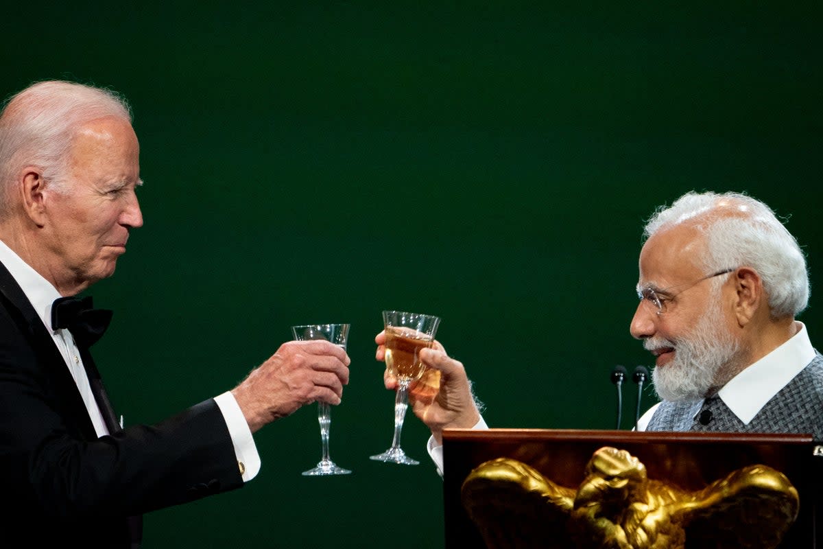 US president Joe Biden and India's prime minister Narendra Modi toast during an official state dinner at the White House (AFP via Getty Images)