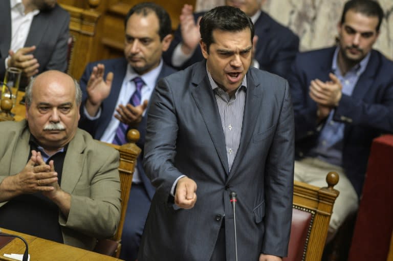 Greek Prime Minister Alexis Tsipras delivers a speech during a parliamentary session in Athens, on July 10, 2015