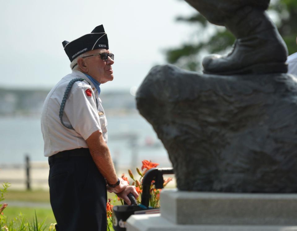 Korean War veteran Larry Cole listens to speakers during a ceremony Thursday at the Korean War Memorial in Hyannis. Cole is a former Harwich resident, selectman and marathon runner who now lives in Weymouth. The ceremony marked the 70th anniversary of the armistice of the Korean War, and was sponsored by the Korean War Veterans Association Cape Cod chapter.