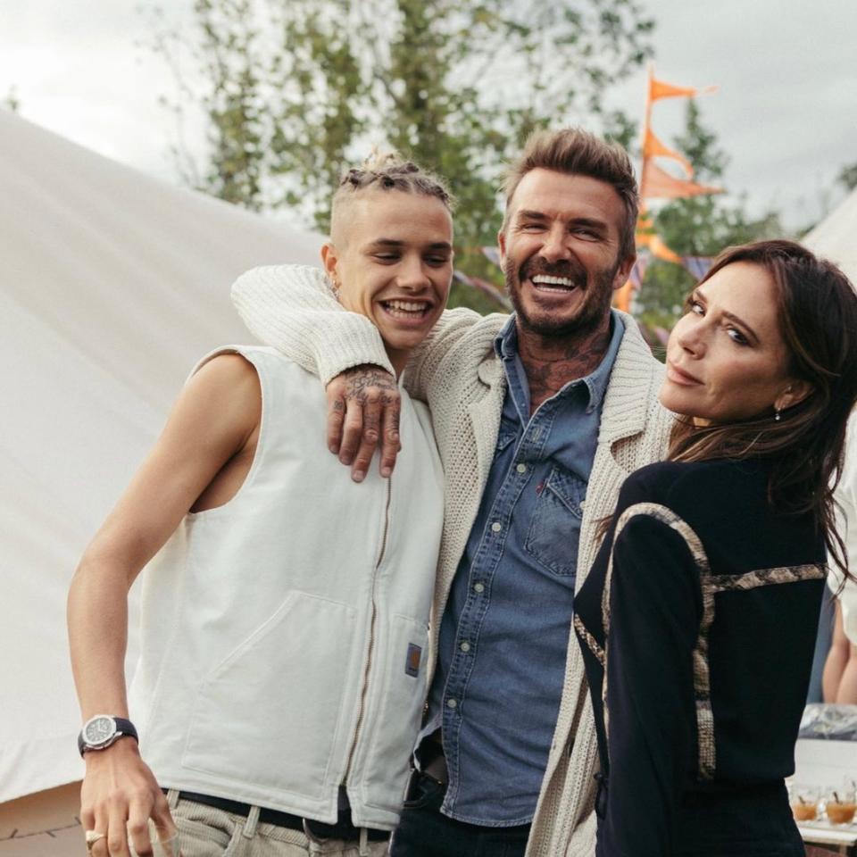 Romeo Beckham with his parents, David Beckham and Victoria Beckham