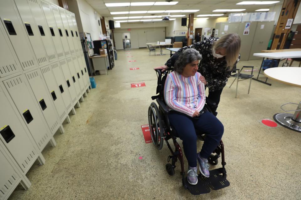 Betty Brarman wheels her daughter Melissa, 44, through the North Jersey Elks Developmental Disabilities Agency in Clifton in March. Advocates say the state needs to do a better job considering the disability community in planning for emergencies like the COVID pandemic.