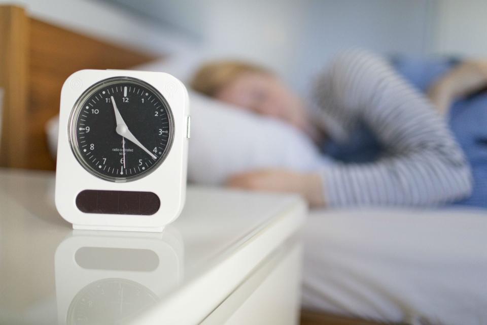 alarm clock woman sleeping