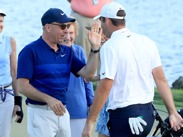 <p>David Cannon/Getty</p> Scottie Scheffler and Scott Scheffler at the Arnold Palmer Invitational in March 2022.