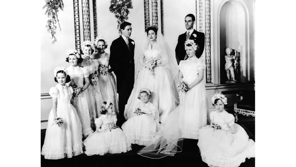 Antony Armstrong-Joens and Princess Margaret surrounded by bridesmaids
