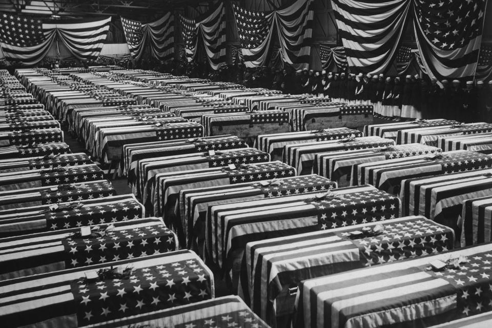 <p>A service is held in Hoboken, NJ, for American soldiers who died on the battlefields of France during World War I, circa 1920. </p><p><strong>RELATED: <a href="https://www.redbookmag.com/life/g4595/beautiful-nature-photos-around-the-world/" rel="nofollow noopener" target="_blank" data-ylk="slk:50 Natural Photos That You Won't Believe Aren't Photoshopped;elm:context_link;itc:0;sec:content-canvas" class="link ">50 Natural Photos That You Won't Believe Aren't Photoshopped</a></strong></p>