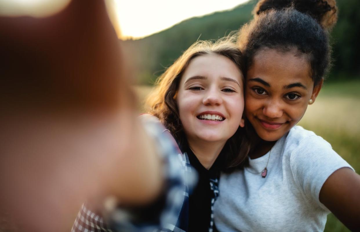 Your kid's silly video could be fodder for ChatGPT. <a href="https://www.gettyimages.com/detail/photo/front-view-of-young-teenager-girls-friends-outdoors-royalty-free-image/1280737244" rel="nofollow noopener" target="_blank" data-ylk="slk:Halfpoint/iStock via Getty Images;elm:context_link;itc:0;sec:content-canvas" class="link ">Halfpoint/iStock via Getty Images</a>