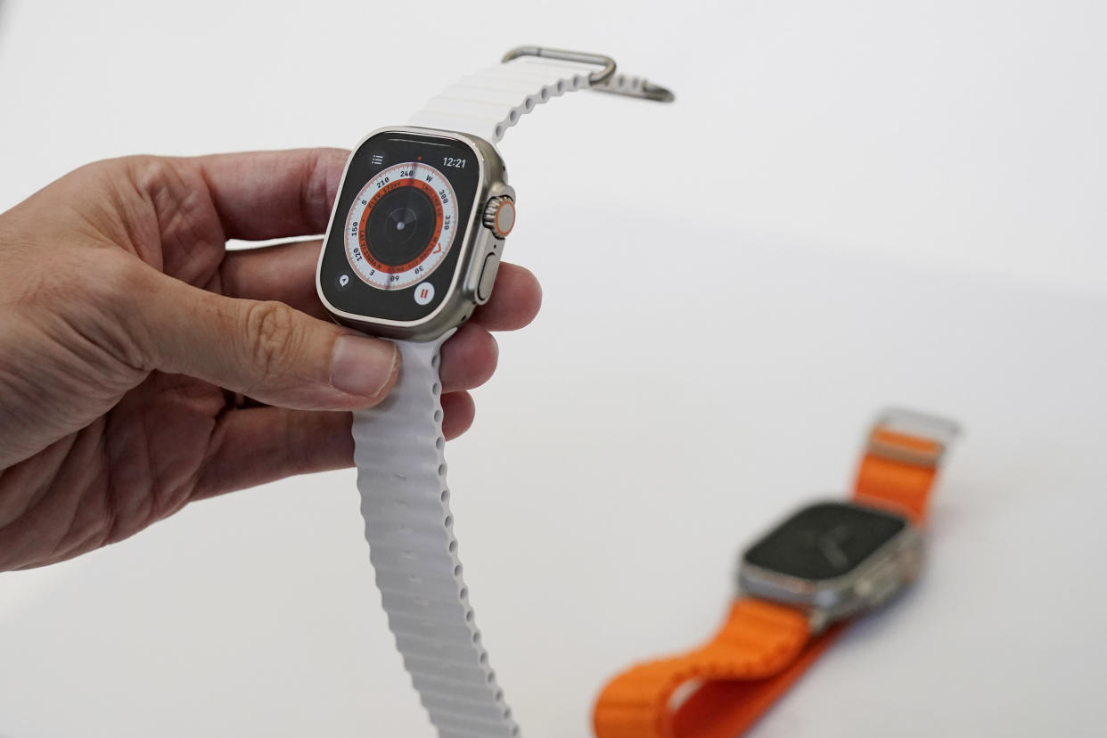 A person holds an Apple Watch Ultra at an Apple event on the campus of Apple's headquarters in Cupertino, Calif., Wednesday, Sept. 7, 2022. (AP Photo/Jeff Chiu)