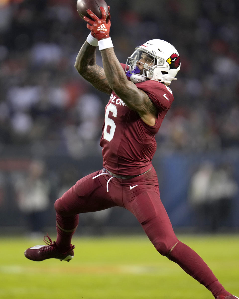 Arizona Cardinals running back James Conner catches a touchdown pass from quarterback Kyler Murray during the first half of an NFL football game against the Chicago Bears Sunday, Dec. 24, 2023, in Chicago. (AP Photo/Erin Hooley)