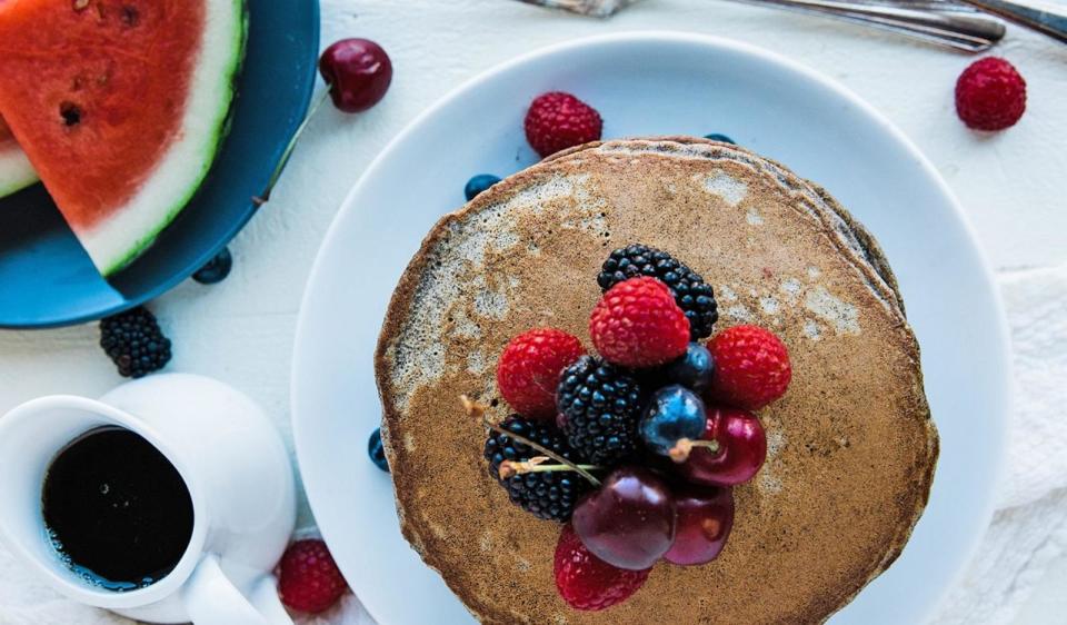 PHOTO: A plate of buckwheat pancakes with fresh fruit. (Bob's Red Mill)