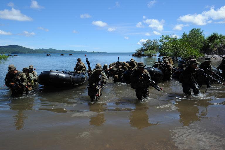 US and Filipino soldiers participate in a 2012 mock beachfront assault on the shore of Ulugan Bay on Palawan island